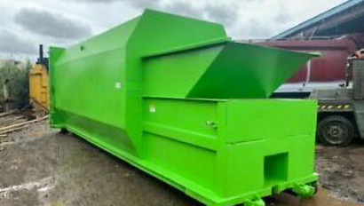 green trash compactor.