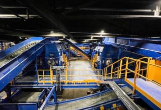 blue and yellow commercial recycling center.