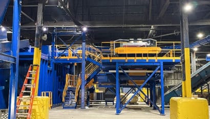 blue and yellow commercial recycling center.