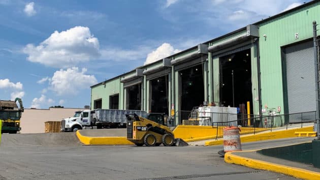 waste services transfer center roll up doors.